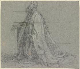 Kniender Mann mit Bart und langem Mantel