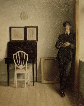 Interieur mit lesendem jungen Mann 1898
