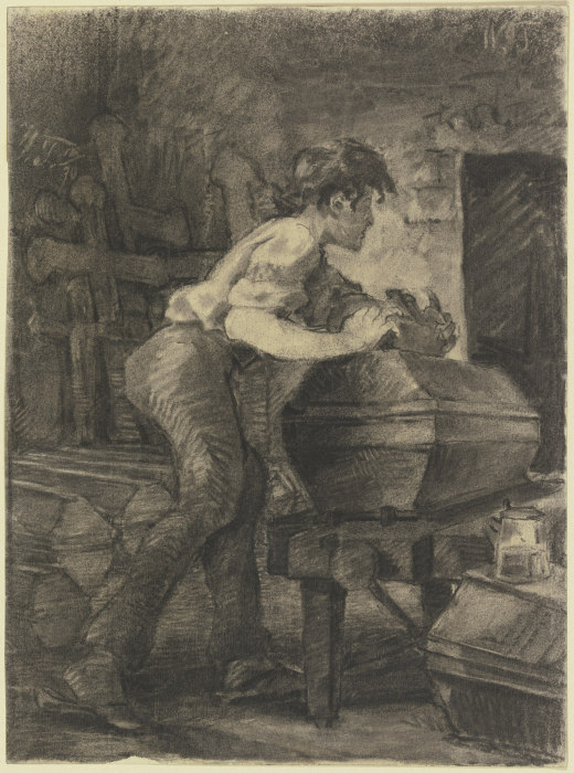 Ein junger Schreiner hobelt in der Werkstatt an einem Sarg von Wilhelm Trübner
