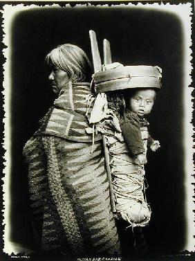 Navaho woman carrying a papoose on her back, c.1914 (b/w photo) 